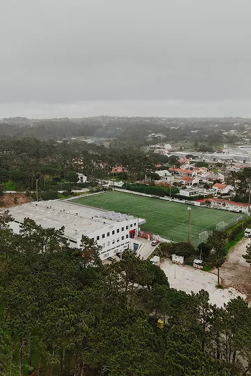 Why Hypha 8 Aerial view of the sports complex and football pitch